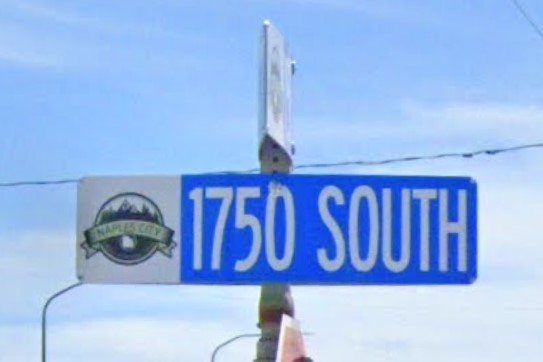 Naples, UT street sign