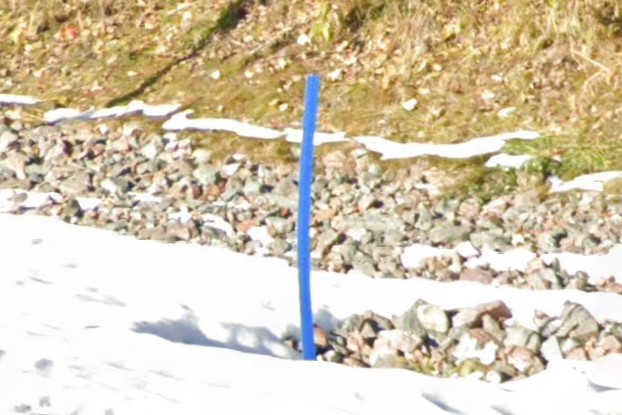 Blue bollard marking drainage