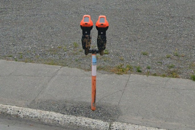Orange parking meters