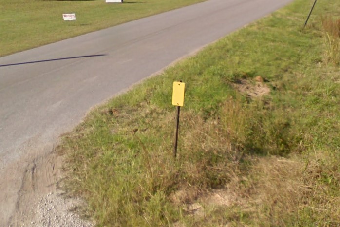 Yellow bollard marking drainage