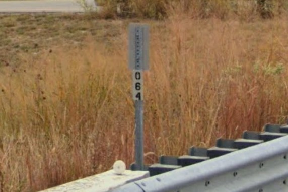 Number behind yellow bridge reflector