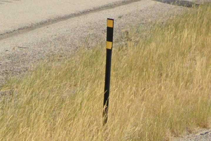 Black plastic bollard